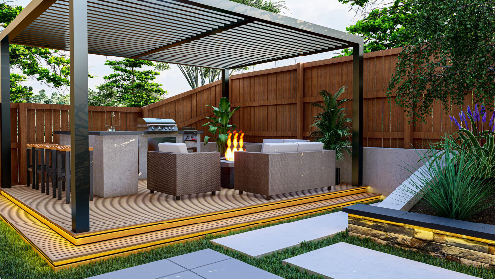 Outdoor kitchen and lounge beneath a pergola with garden planting